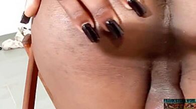 Sultry Black Trans Delights In Self-pleasure