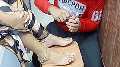 Boy Put Nail Polish On Girl Feet